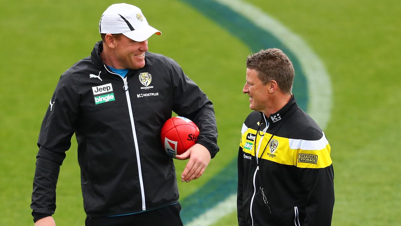 MELBOURNE, AUSTRALIA - SEPTEMBER 21: Damien Hardwick, coach of the Tigers and Justin Leppitsch, Tigers Forwards coach talk during a Richmond Tigers AFL training session at Punt Road Oval on September 21, 2017 in Melbourne, Australia. (Photo by Scott Barbour/Getty Images)