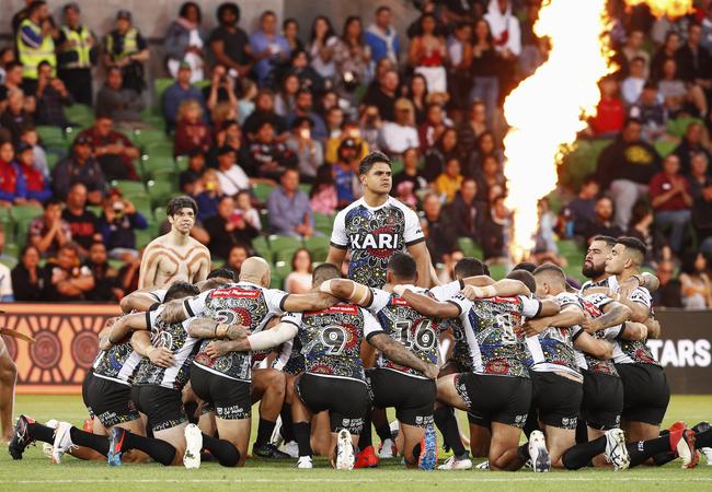 Indigenous players perform a traditional war cry, led by Latrell Mitchell. 