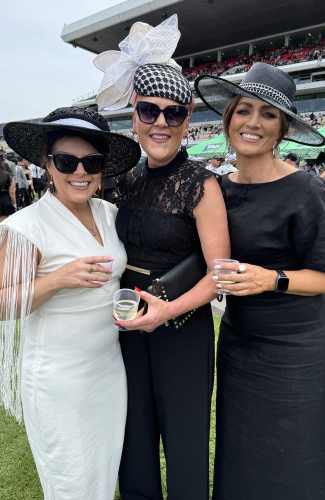 Elise McKenzie, Janey Nobel and Peta Collins at Flemington for Derby Day on November 2, 2024. Picture: Phillippa Butt