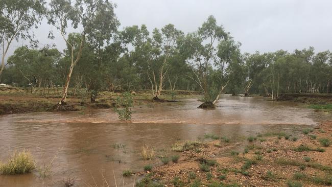 The Todd River flows following heavy rain