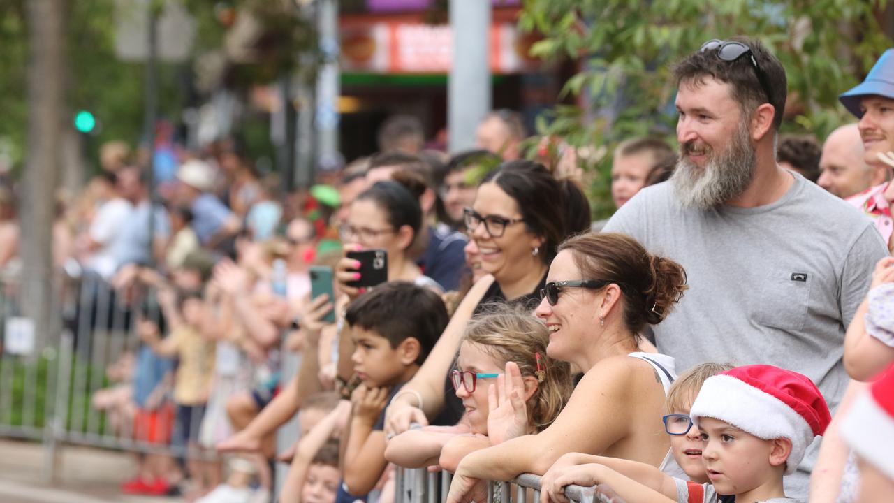 Crowds line the route for the annual Christmas Pageant and Parade down the Esplanade and Knuckey Streets. Picture: Glenn Campbell