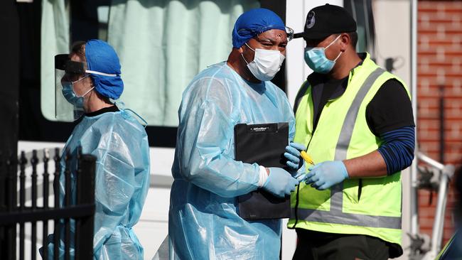 Nurses prepare to test people at a COVID-19 testing facility in Eden Terrace in Auckland, New Zealand today. Picture: Getty Images