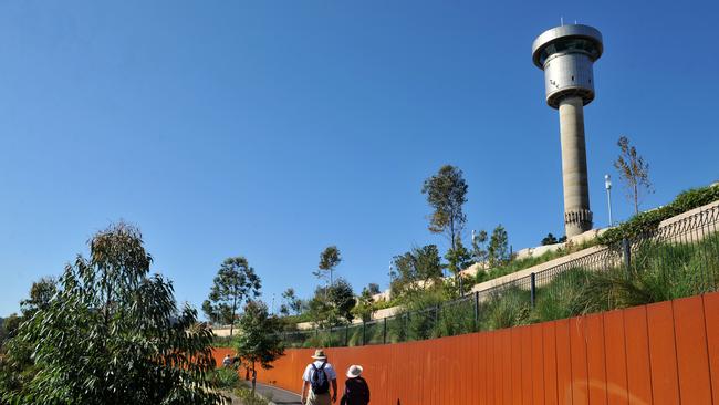 The Sydney Ports’ harbour control tower looks over the new Barangaroo Reserve, but maybe not for much longer. (AAP Image/Joel Carrett)