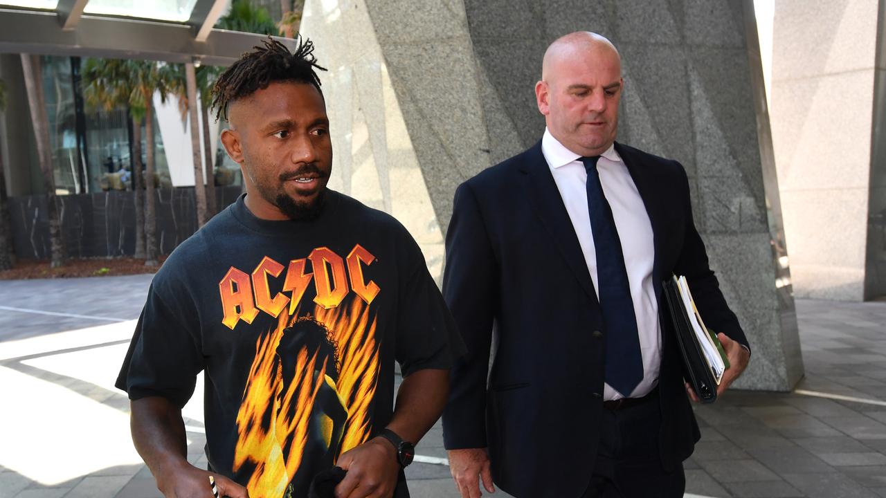 Former Brisbane Broncos player James Segeyaro arrives in an ACDC t-shirt and shorts for his hearing with ASADA.