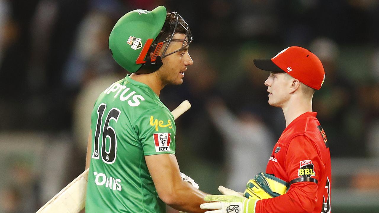 Stoinis shakes hands with Renegades keeper Sam Harper after the match. Pic: Getty Images