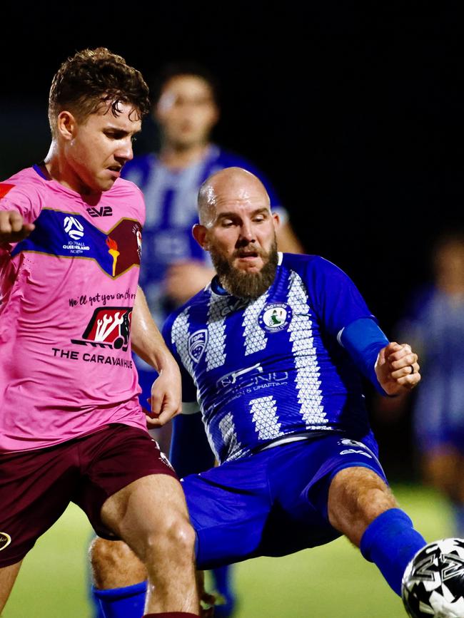 Jeremy Brockie (right) scored a hat-trick for Brothers Townsville in their clash with MA Olympic FC. Picture: Sharon Woodward