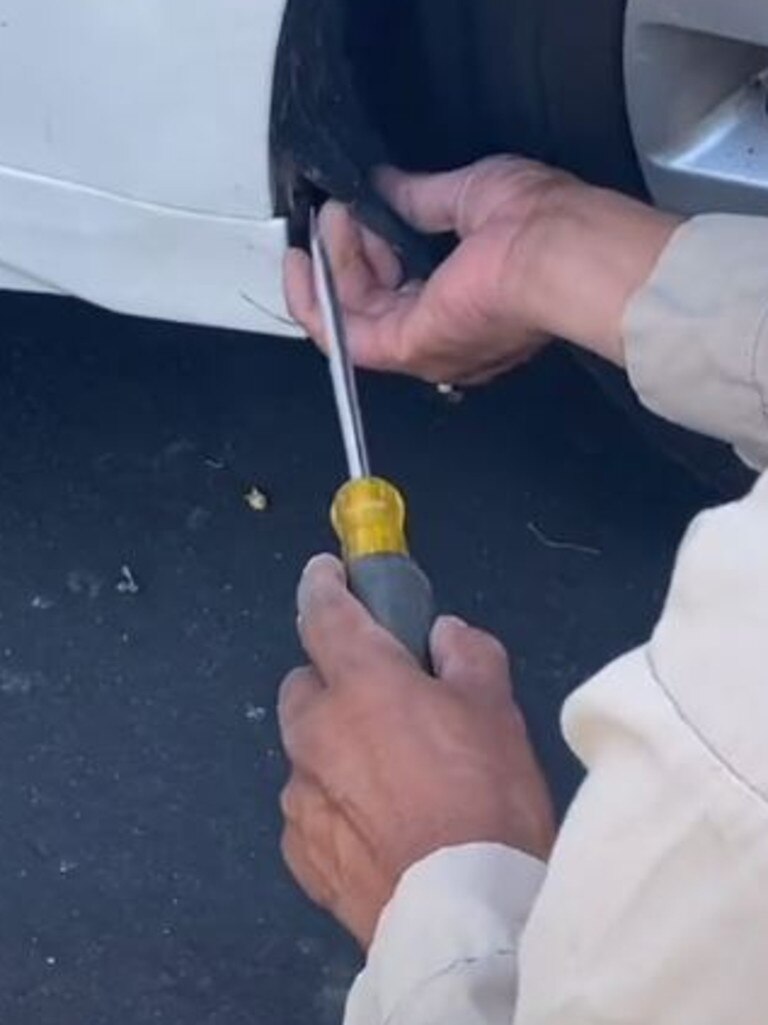 A handyman took to the car with a screwdriver. Picture: TikTok/_danz_1999