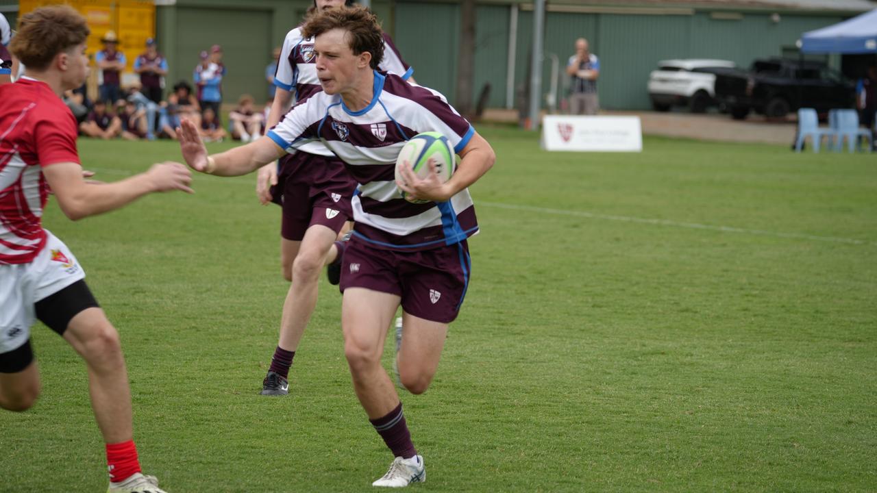 TAS First XV rugby action between St Paul's and John Paul College in round one of the season.