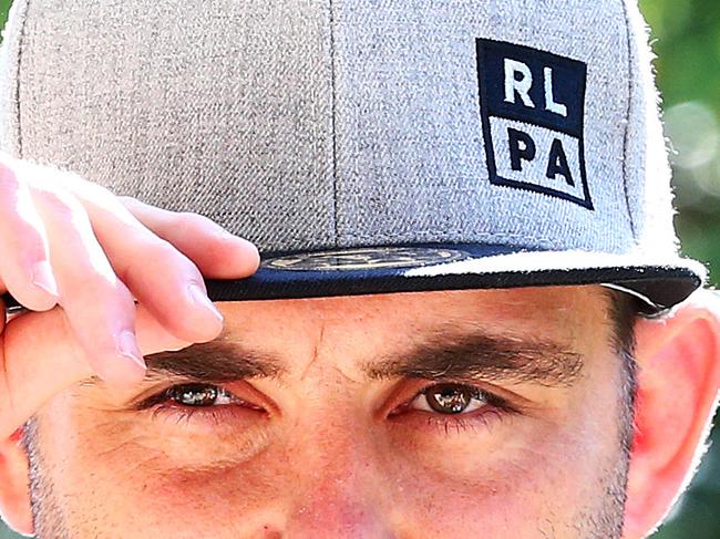 Queensland State of Origin player Cameron Smith wearing his RLPA cap during a media session before game 3, Rydges Hotel, South Brisbane.  Photographer: Liam Kidston.