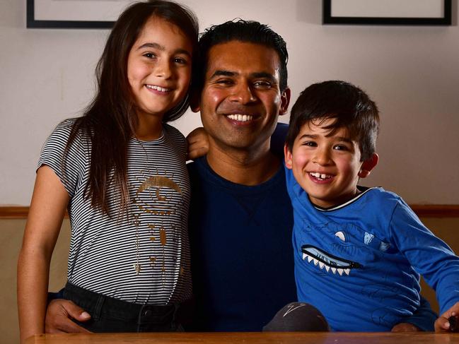 Flinders University Associate Professor Niranjan Bidargaddi with his children Elke and Ravi. Picture: Bianca De Marchi