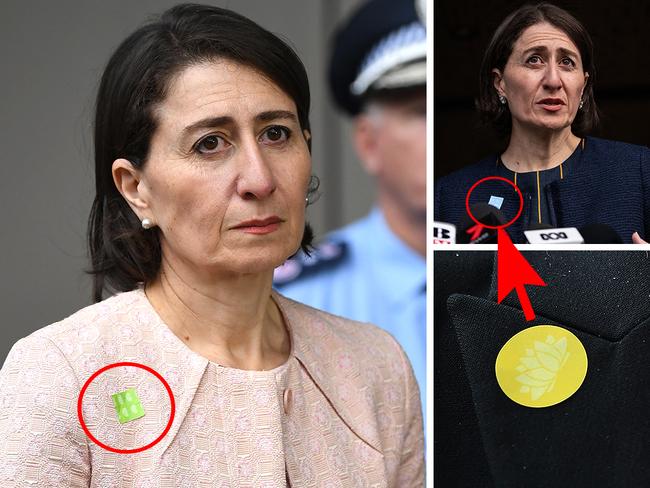 The colour-coded stickers being sported by Gladys Berejiklian.