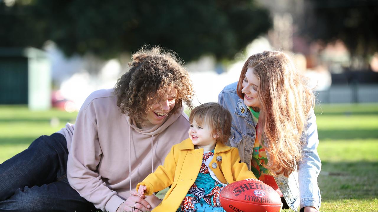 Brown and his wife Hester and their 17 month old, Aila, in Moonee Ponds. Picture Rebecca Michael.