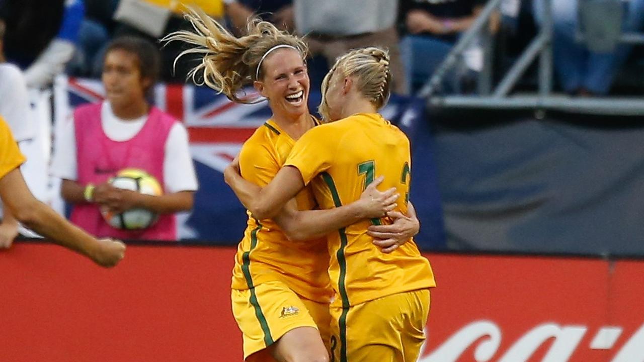 Tameka Butt celebrates with Elise Kellond-Knight. Otto Greule Jr/Getty Images/AFP 