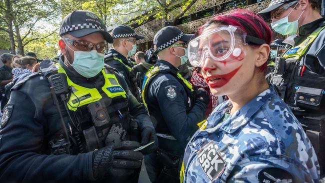 A protester in Melbourne. Picture: Jake Nowakowski