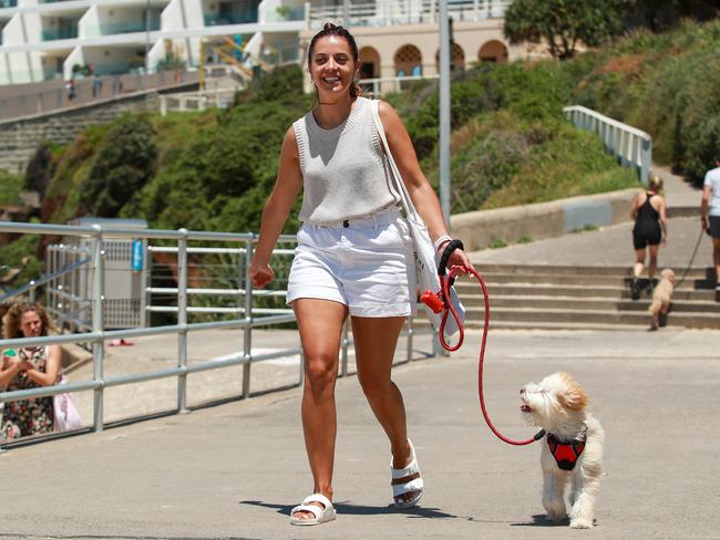 Irene Benitez, with Pistachio, at Bondi Beech, today. Sydney has been named the second healthiest city in the world according to a UK Healthy lifestyles report.Picture:Justin Lloyd