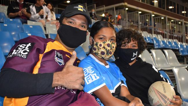 Broncos fan Leo Morrison (left), Panthers supporter Lailani Morrison and Broncos boy George Morrison at the Manly Sea Eagles v Sydney Roosters NRL semi final match at BB Print Stadium, Mackay, September 17, 2021. Picture: Matthew Forrest