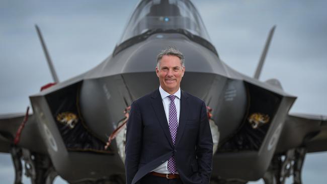 Richard Marles with an F-35A fighter jet. Picture: David Caird