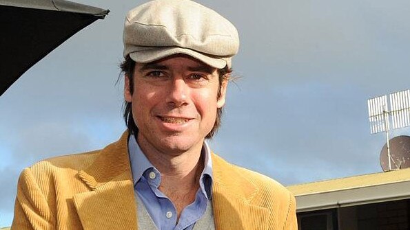 Gillon McLachlan wears his famous mustard jacket at Warrnambool more than a decade ago.