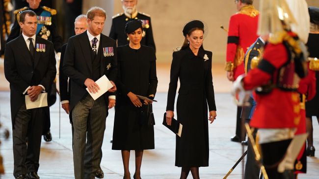 Kate and Meghan stood alongside each other during the lying in state service. Picture: Jacob King - Pool/Getty Images.