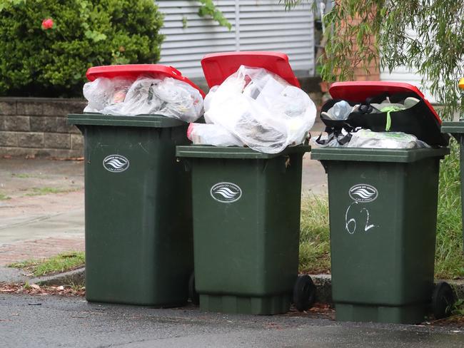 Red and yellow topped bins in the Randwick, Kensington and Kingswood areas – some overflowing. Picture: John Grainger