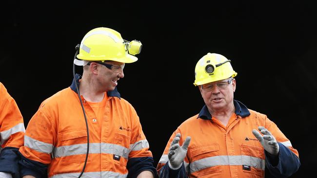 Politicians Matt Kean and Joel Fitzgibbon come out of the drift with mine workers at Centennial Coal, Mandalong Mine, following a tour underground. Picture: Peter Lorimer