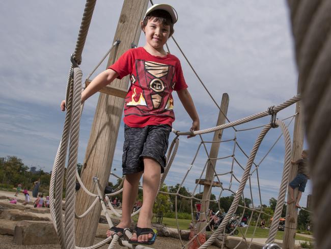 Xavier, 6, at Royal Park Nature Play, which is in our top 5 Melbourne playgrounds. Picture: Christopher Chan