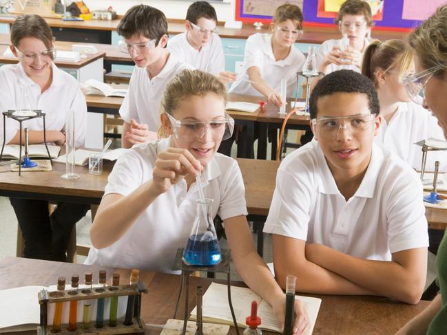 QST Enrolments generic school children conducting science experiment