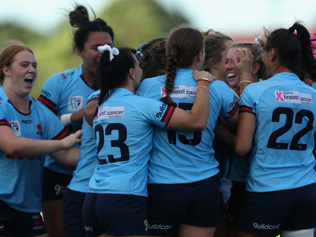 SYDNEY, AUSTRALIA - APRIL 08: The NSW Waratahs celebrate after scoring a try during the Super W match between NSW Waratahs Women and Fijian Drua at Concord Oval, on April 08, 2023, in Sydney, Australia. (Photo by Tim Allsop/Getty Images)