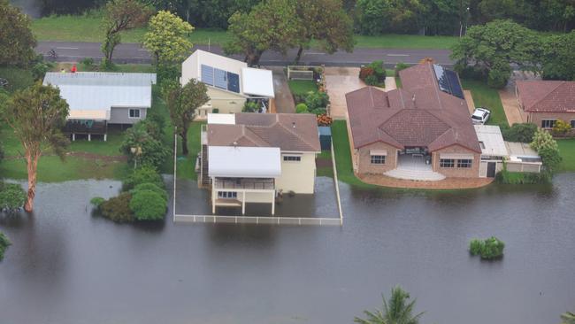 Forrest Beach homes under water. Pics Adam Head