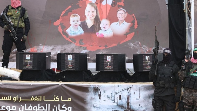 Hamas-style bellicosity repulses more Westerners than it attracts. Armed Hamas militants stand next to the coffins on stage before handing over the bodies of four Israeli hostages to the Red Cross in Khan Yunis on Thursday night.