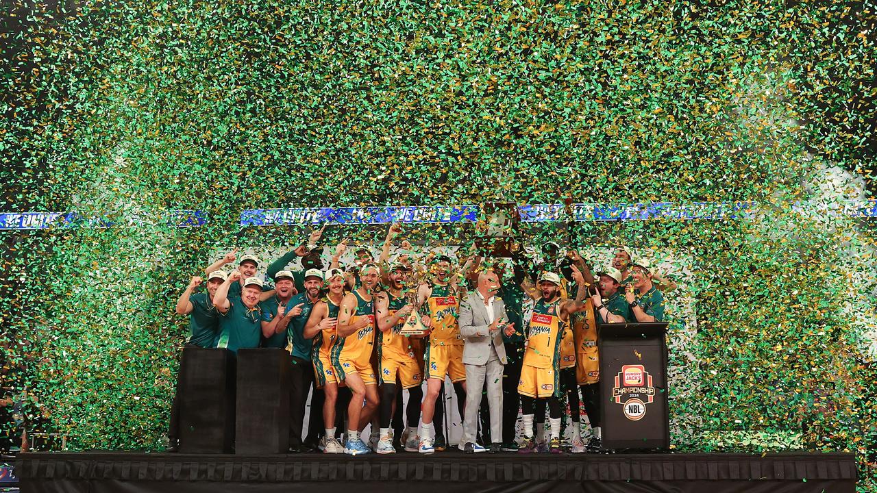Tasmania’s JackJumpers celebrate with the trophy during game five of the NBL Championship Grand Final Series against Melbourne United. Picture: Kelly Defina/Getty Images