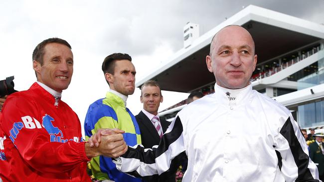 Guard of honour for champion jockey Jim Cassidy.