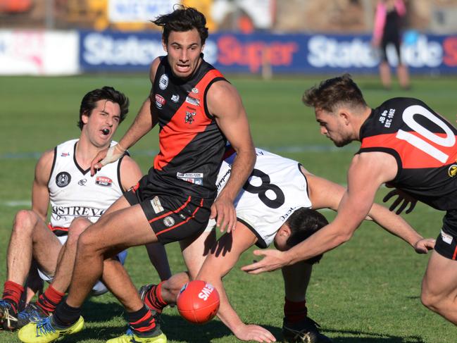 Adelaide Footy League, Division 1 Grand Final Tea Tree Gully v Rostrevor at Thebarton Oval, Saturday, September 22, 2018. Player of the match Troy Menzel and Thomas Blieby from Tea Tree Gully have eyes for the ball. (AAP Image/ Brenton Edwards)