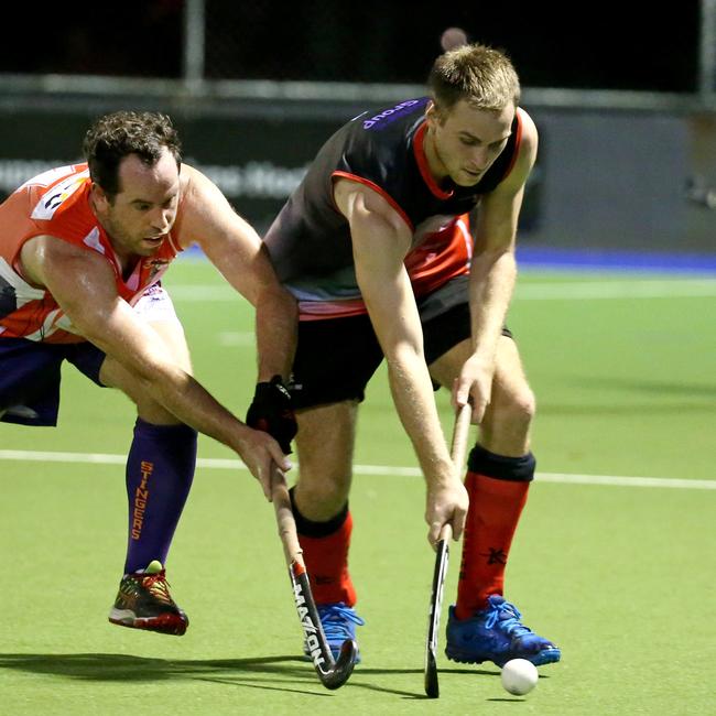 Cairns Hockey A-grade. Souths v Trinity Stingers. Stingers Brent Garske and Souths Micah Darbyshire. PICTURE: ANNA ROGERS