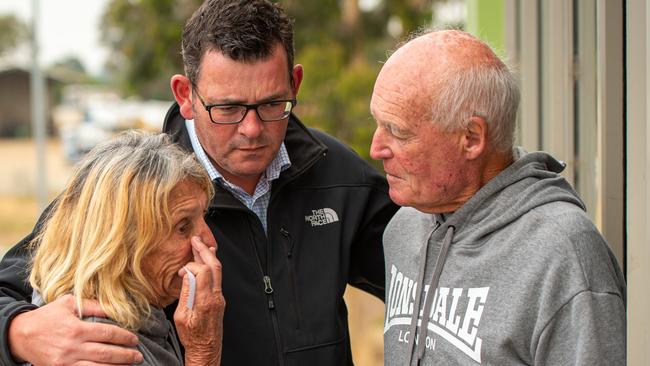 Victorian Premier Daniel Andrews speaks to Jilly Brown and husband Mel, who lost their 120 year old Sarsfield home. Picture: Jason Edwards