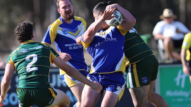 Headless: The moment Ethan Tasoulis is levelled. Picture: Steve Montgomery