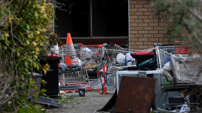 Shopping trolleys litter the property in Cleeland St.