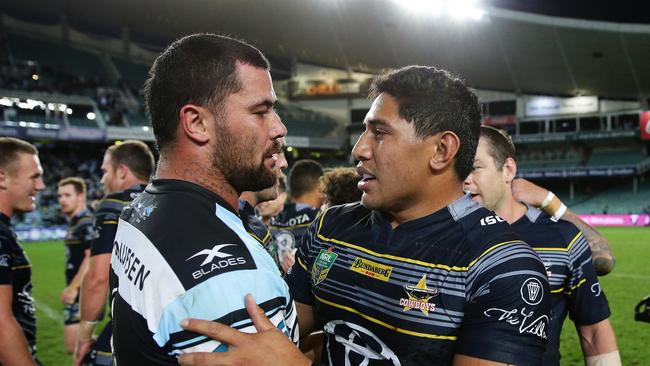 Cowboy's Jason Taumalolo with Cronulla's Andrew Fifita after the Cowboys victory in the Cronulla v Cowboys Elimination Final at Allianz Stadium, Sydney. Picture: Brett Costello