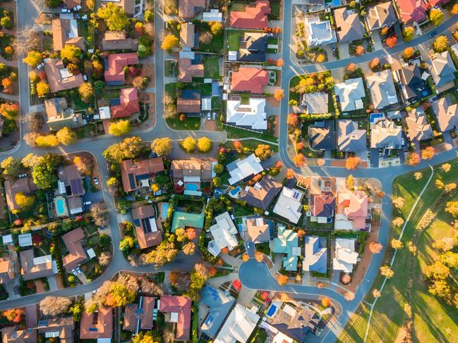 Typical Australian suburb from above in autumn; housing overhead generic