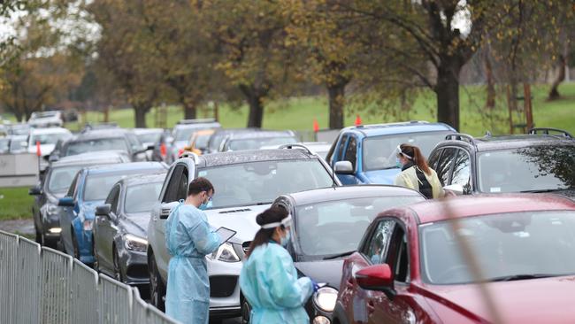 Lines of cars form at the Albert Park Covid testing facility during a new outbreak in Melbourne today. Picture: David Crosling