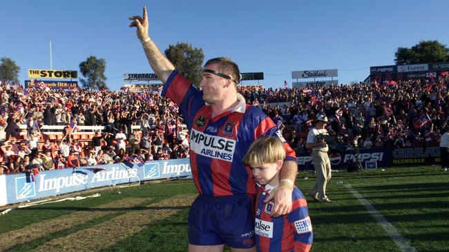 Tony Butterfield with son Isaac (7) during lap of honour after his last home game for Newcastle in 2000. 