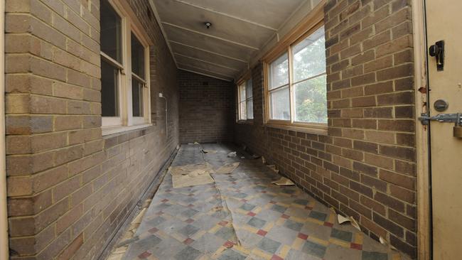 This once lived-in house at 535 Merrylands Rd, Merrylands is now run-down. Picture: Phil Rogers