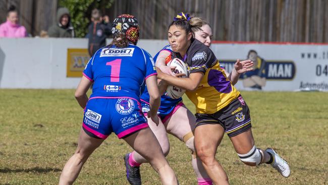 Natalia Webb for Gatton tackled by Amanda Hinch and Taylah Ebzery for Newtown. Picture: Nev Madsen.