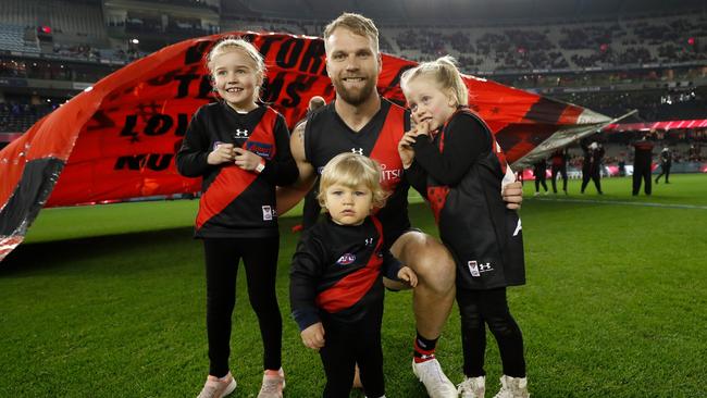 Jake Stringer with his children Milla, Arlo and River, before his 150th match. (Photo by Michael Willson/AFL Photos via Getty Images)