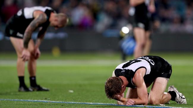 Todd Marshall and Hamish Hartlett after Port Adelaide’s preliminary final loss to Richmond last year. Picture: James Elsby/AFL Photos