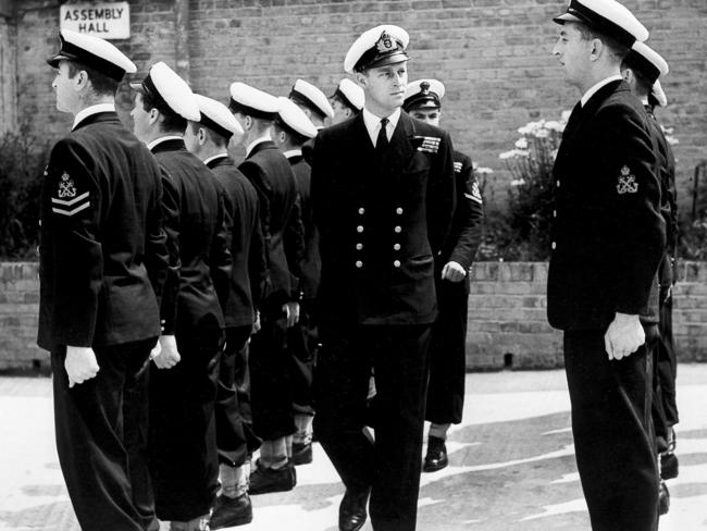 In this July 31, 1947 file Lieut. Philip Mountbatten, as he was then called inspects his men at the Petty Officers' Training Center at Corsham, England. Picture: AP