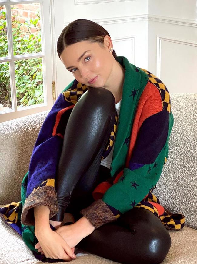 ‘Casual Fridays’. Miranda Kerr in wet-look leggings and a chunky cardigan – two trends of the post-iso era. Picture: Instagram