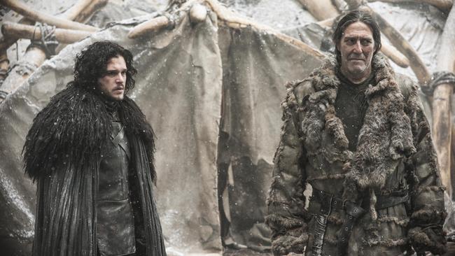 Jon Snow, portrayed by Kit Harington, left, appears with Mance Rayder, portrayed by Ciaran Hinds in a scene from season four.