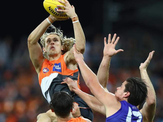 Nick Haynes flies for a mark in last year’s preliminary final against the Bulldogs. Picture: Getty Images