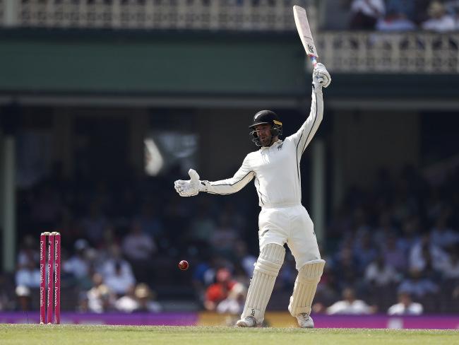 New Zealand's Tom Blundell is struck by a delivery from Pat Cummins during a spicy final session. Picture: Getty